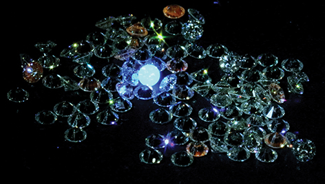 Specialized Gemological Lighting Reveals a Mined Diamond, Glowing Blue (PRNewsfoto/Ada Diamonds)